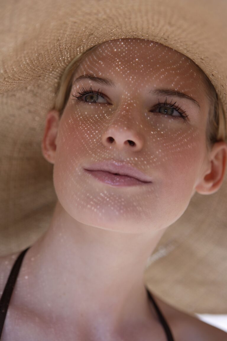 woman wearing a hat thinking about treatments for dehydrated skin